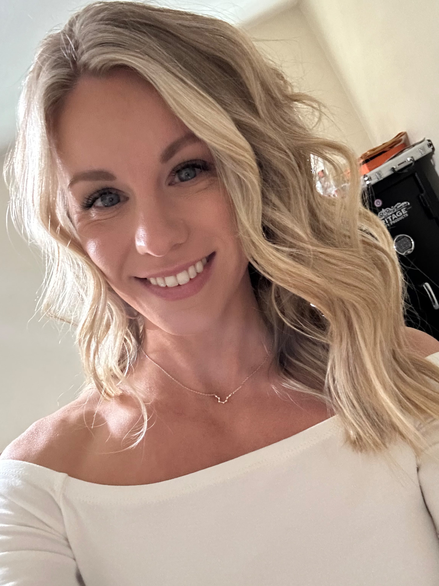 Portrait of Kaylyn, Stylist at Salon W in Lodi, California, specializing in blonding, haircuts, balayage